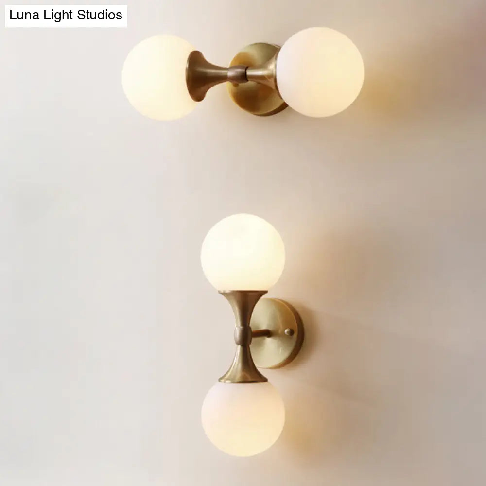 Ivory Glass Ball Wall Lamp With 2-Head Brass Sconce For Bedroom