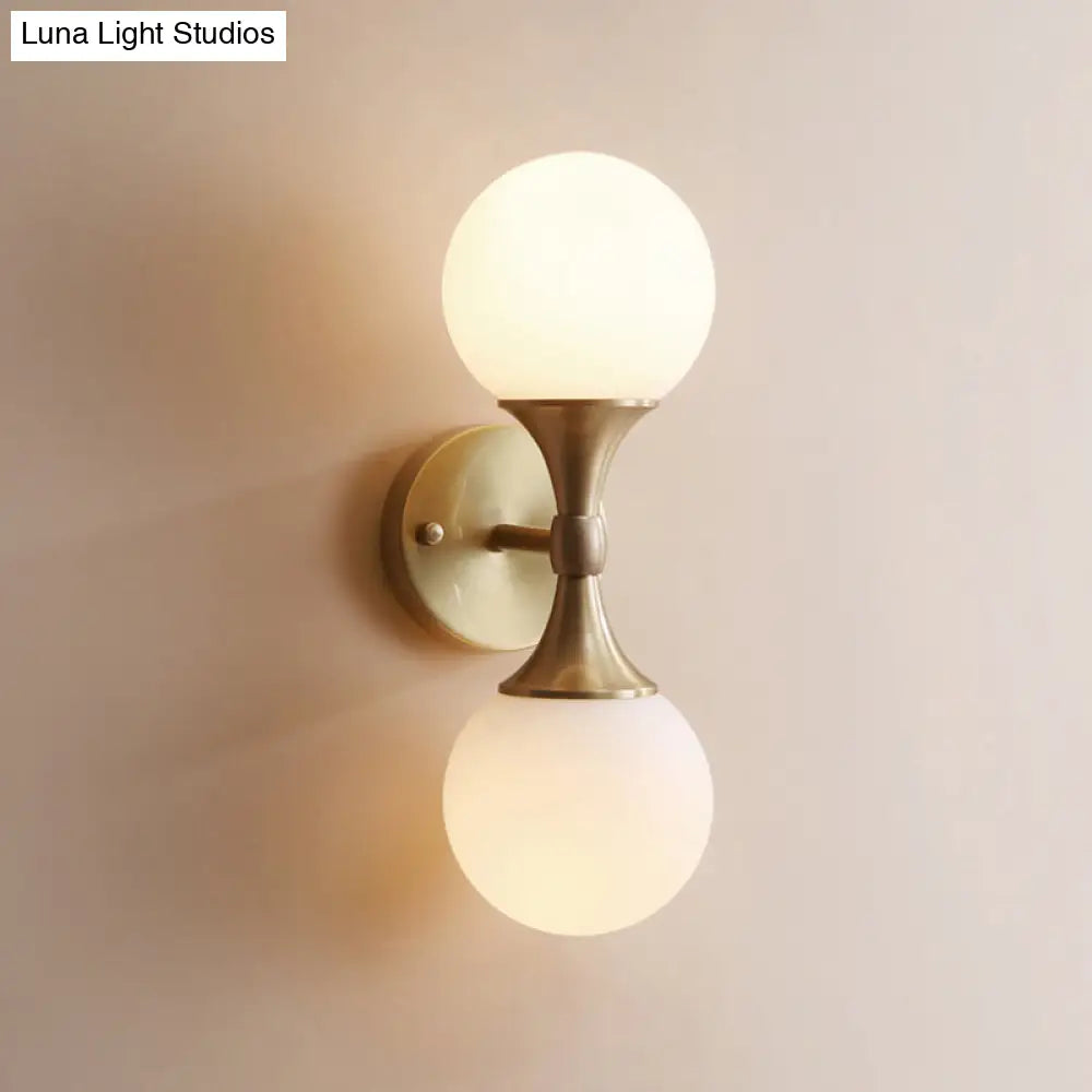 Ivory Glass Ball Wall Lamp With 2-Head Brass Sconce For Bedroom