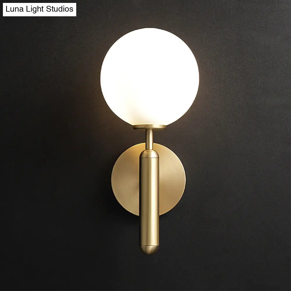 Milky Glass Ball Sconce - Contemporary 1-Head Brass Wall Light Fixture With Metal Arm