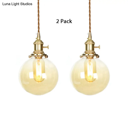 Amber Pendant Light With Adjustable Cord And Globe Glass Shade - Industrial Indoor Lighting / 2