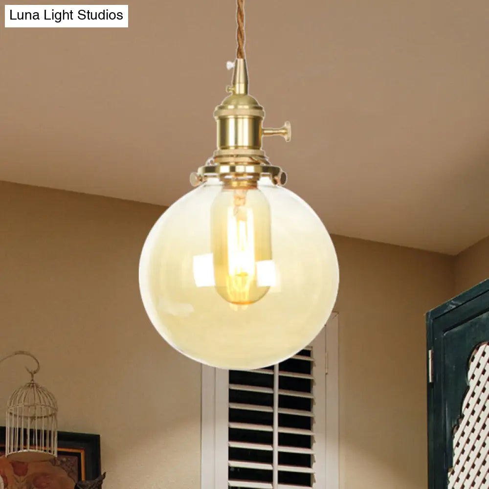 Amber Pendant Light With Adjustable Cord And Globe Glass Shade - Industrial Indoor Lighting / 1