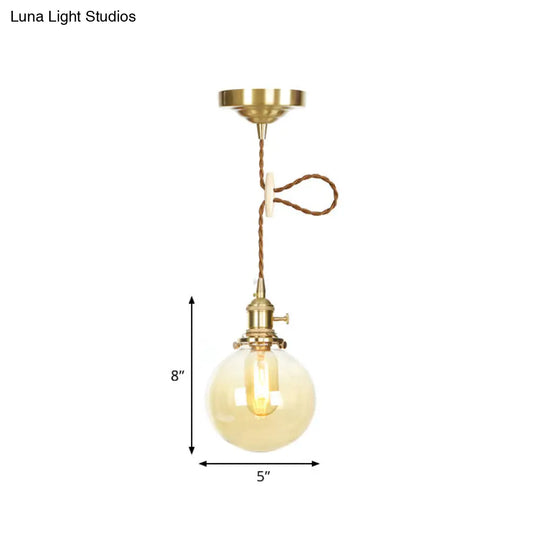 Amber Pendant Light With Adjustable Cord And Globe Glass Shade - Industrial Indoor Lighting