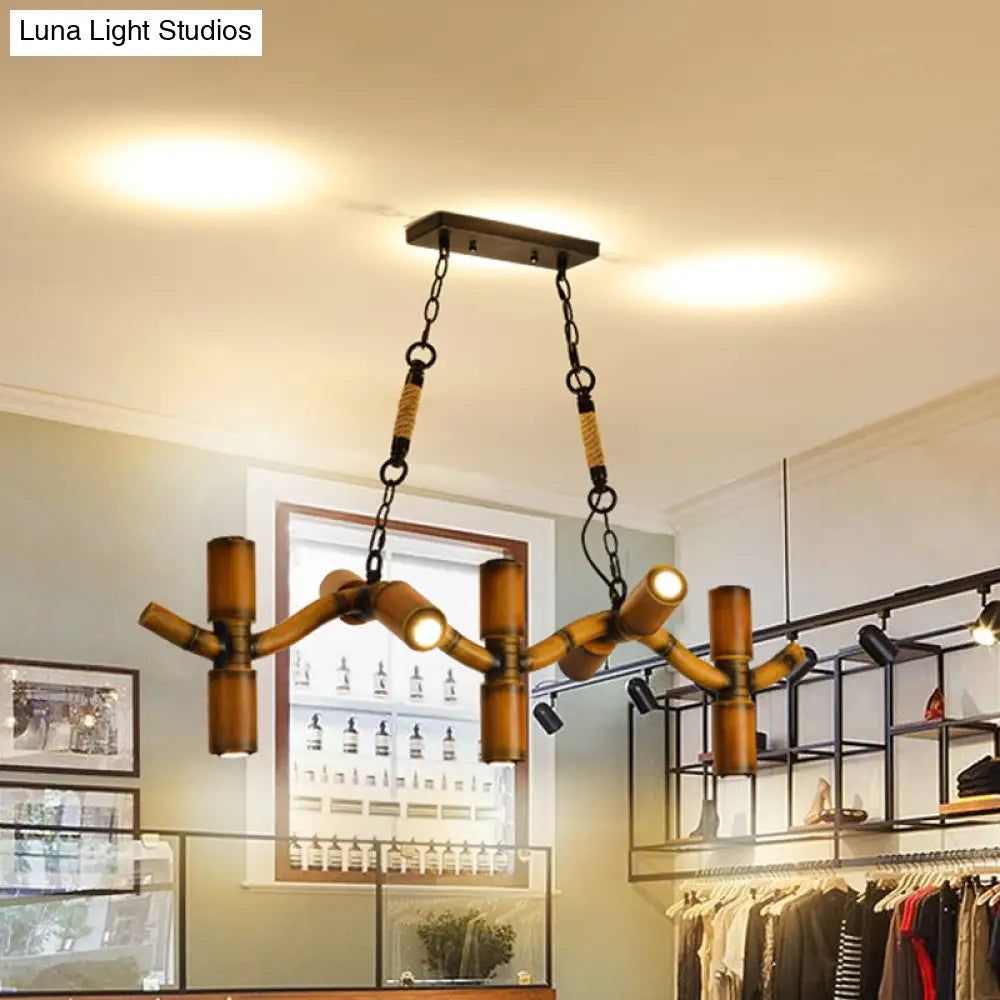 10-Light Metal Island Pendant In Brown With Wave Style Pipe Shade And Rope Detail.