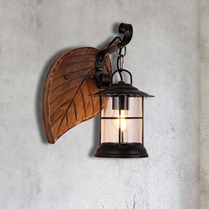 Antiqued Kerosene Wall Sconce With Clear Glass And Wood Leaf/Key Backplate For Dining Room Lighting