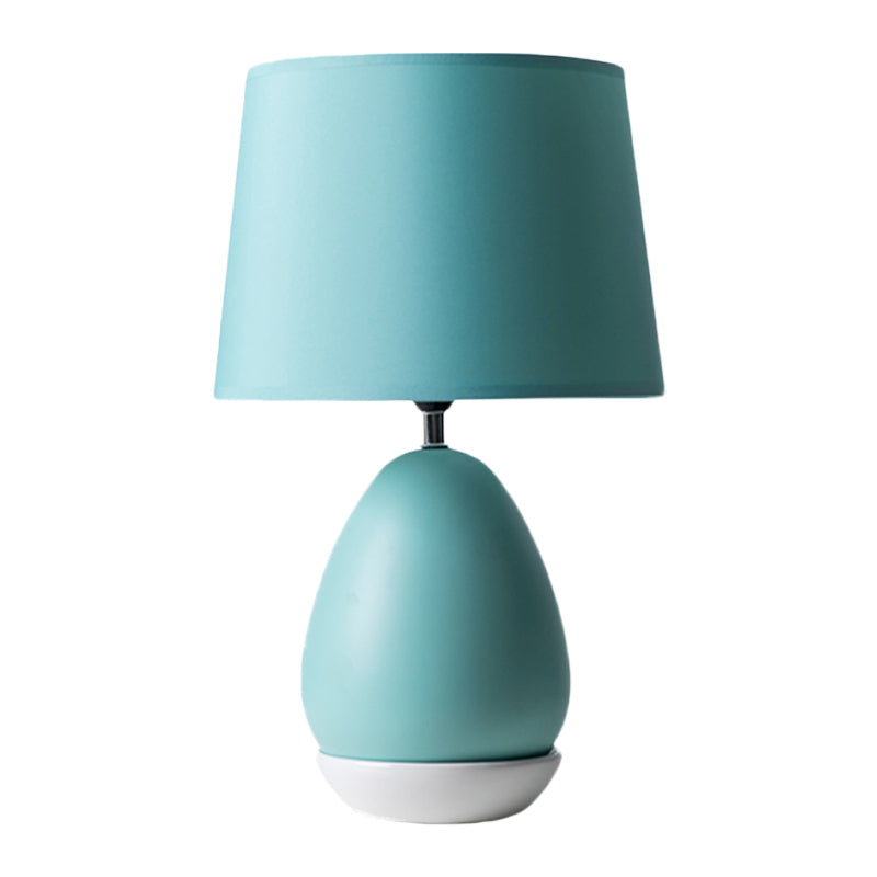 Modern Ceramic Egg-Shaped Bedside Night Light With Blue Drum Fabric Shade