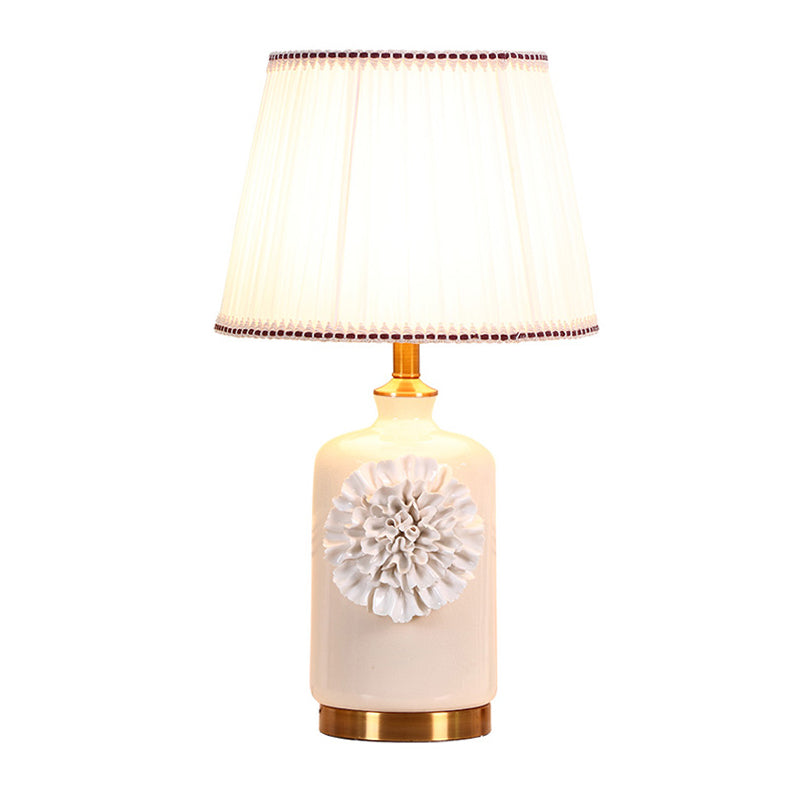 Modern White Truncated Cone Table Lamp With Pleated Fabric Shade And Flower Decor