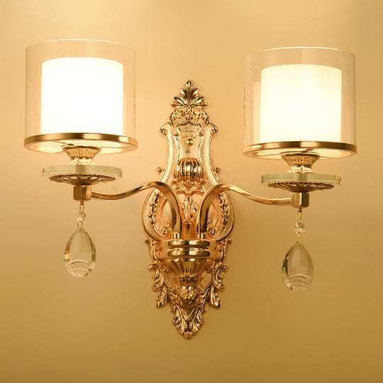Modern Dual Cylinder 2-Light Gold Wall Sconce With Clear And Frosted Glass
