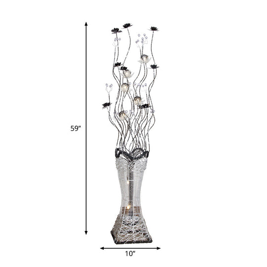 Contemporary Torch-Like Led Floor Light With Curvy Arm And Floret Decor In Black/Silver