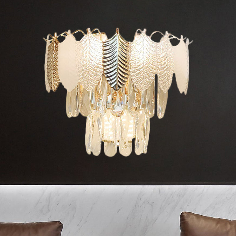 Modern Crystal Wall Sconce With Tapered Design Golden Accents And Acrylic Leaves