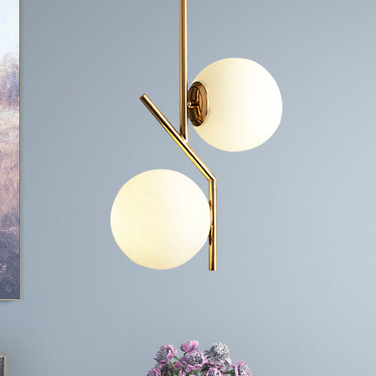 Contemporary Gold Linear Chandelier With 2 White Glass Sphere Lights - Metal Hanging Fixture