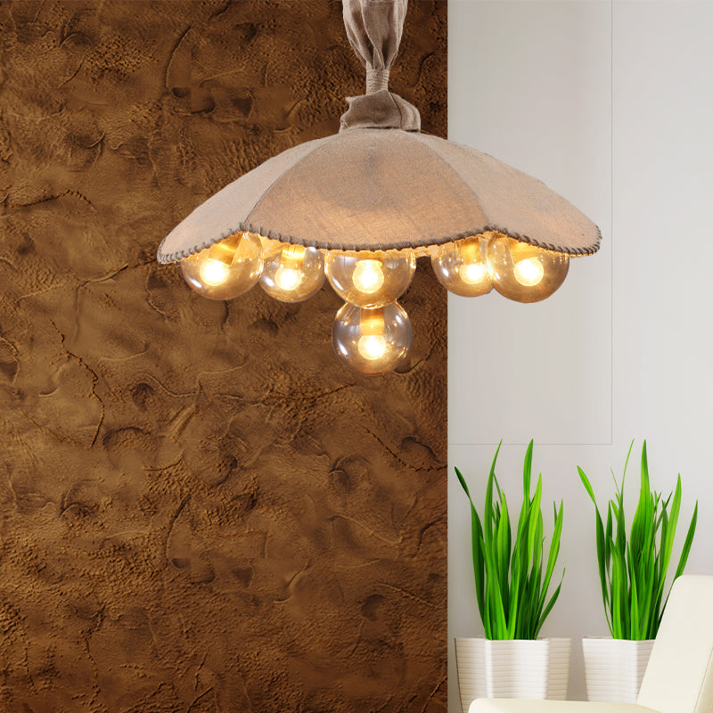 Beige Scalloped Pendant Light: Lodge Chandelier with 6 Fabric Heads & Glass Ball Shade