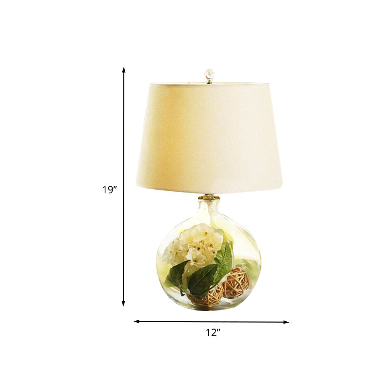 1-Light Fabric White Nightstand Lamp With Industrial Tapered Design And Floral Rattan Ball Decor