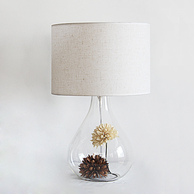 Pastoral Fabric 1-Light Table Lamp With White Drum Shade Vase Clear Glass Base & Dried Flower Accent