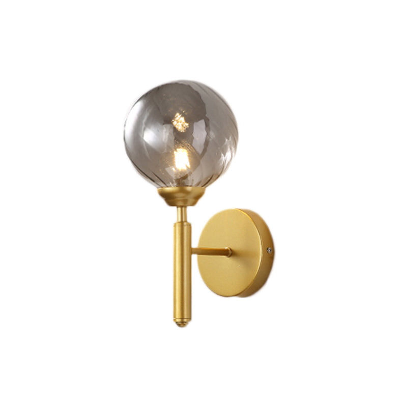 Modern Brass Wall Light With Smoked Textured Glass Globe Bulb