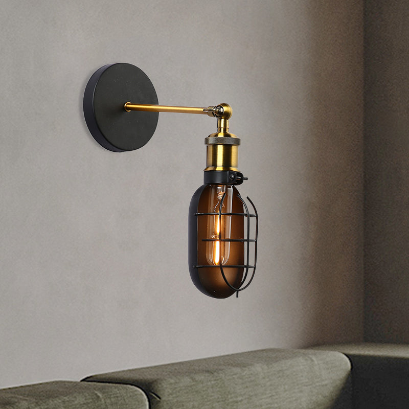 Industrial Metal Black And Brass Wall Lamp With Capsule Cage Design - 1 Head Sconce For Restaurant