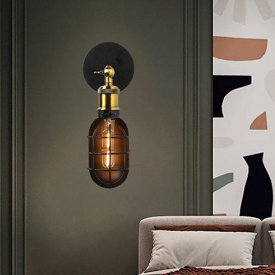 Industrial Metal Black And Brass Wall Lamp With Capsule Cage Design - 1 Head Sconce For Restaurant