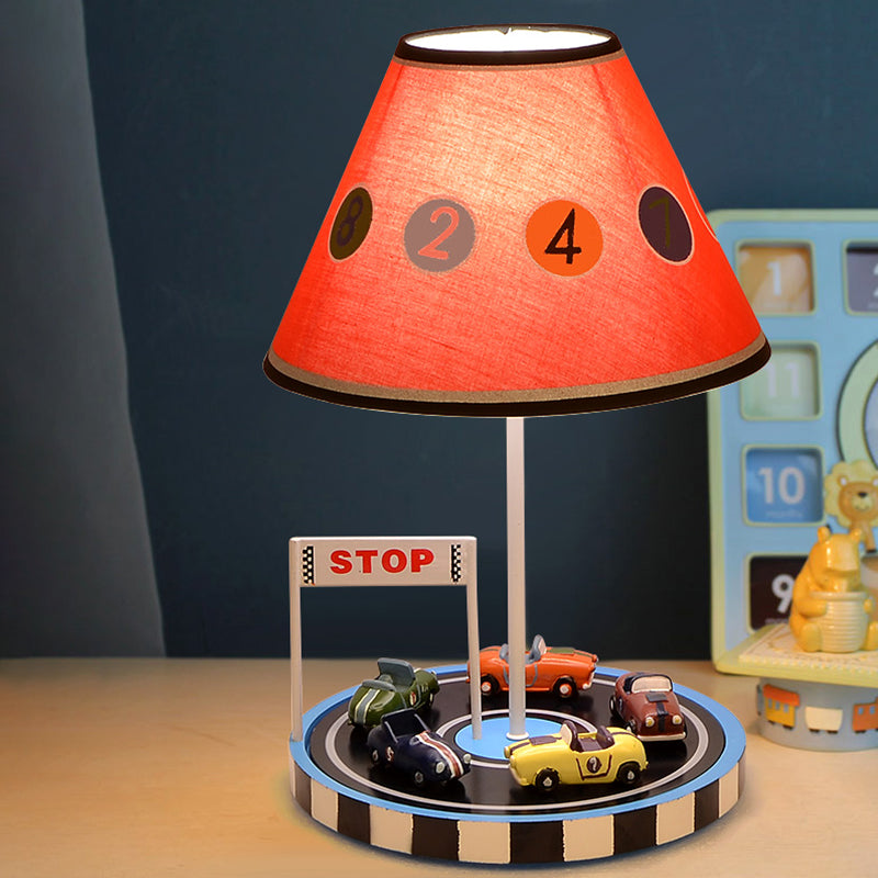 Red Racing Vehicle Tapered Fabric Table Light For Kids - 1-Bulb Nightstand Lighting