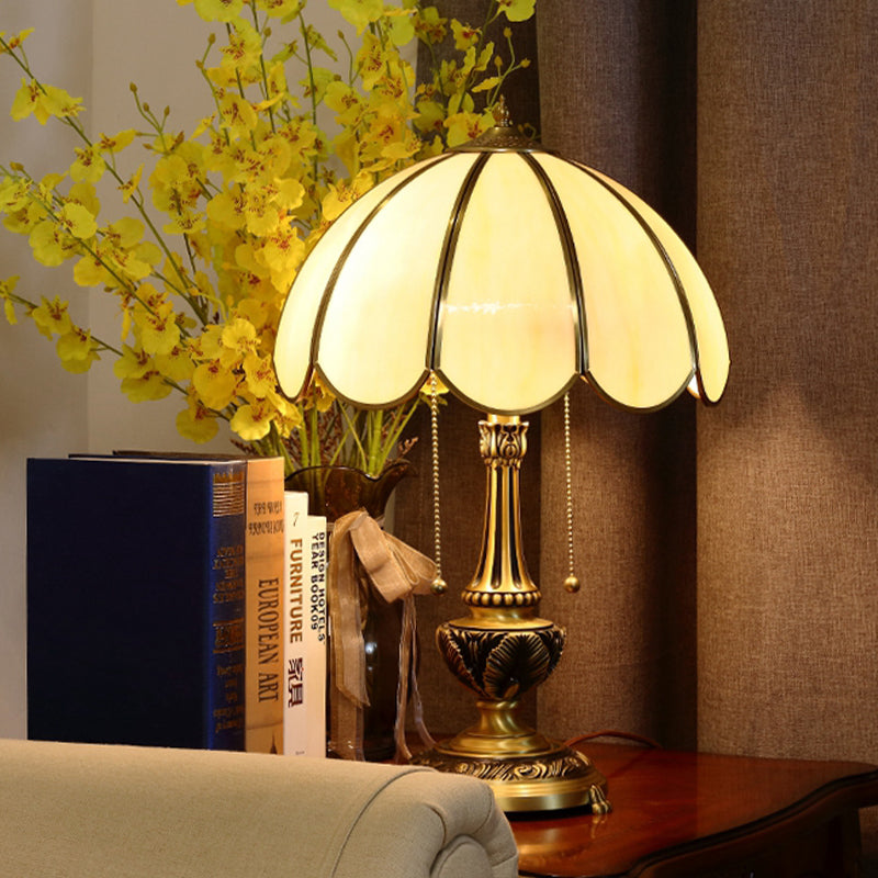 Colonialist Beige Glass 1-Bulb Nightstand Lamp - Gold Scalloped Metal Table Light With Pull Chain /