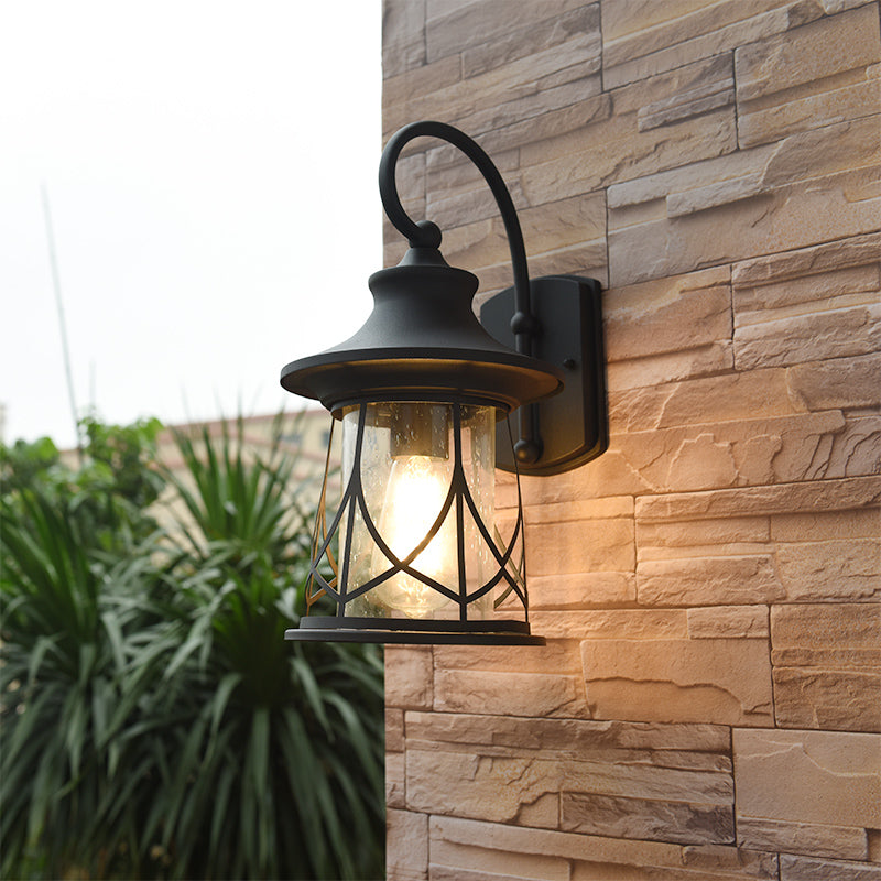 Industrial Porch Sconce With Seeded Glass Lantern Shade And One Bulb Black