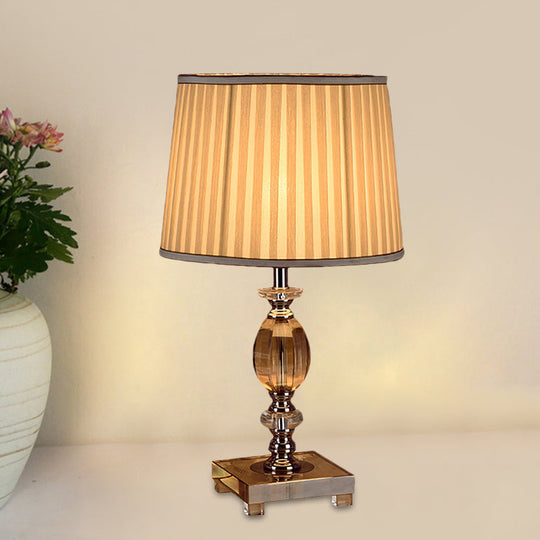 Modernist Font Nightstand Light - Clear Crystal Bedside Lamp With Pleated Shade Beige