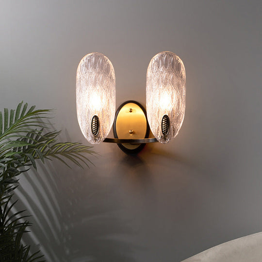 Modern Textured Glass Oval Wall Lamp 1/2-Light Fixture In Black & Gold For Corridor