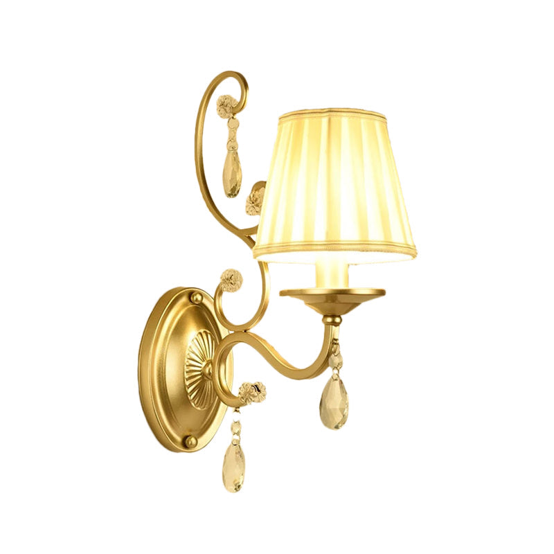 Contemporary Crystal Wall Sconce With Curved Arm And Brass Finish