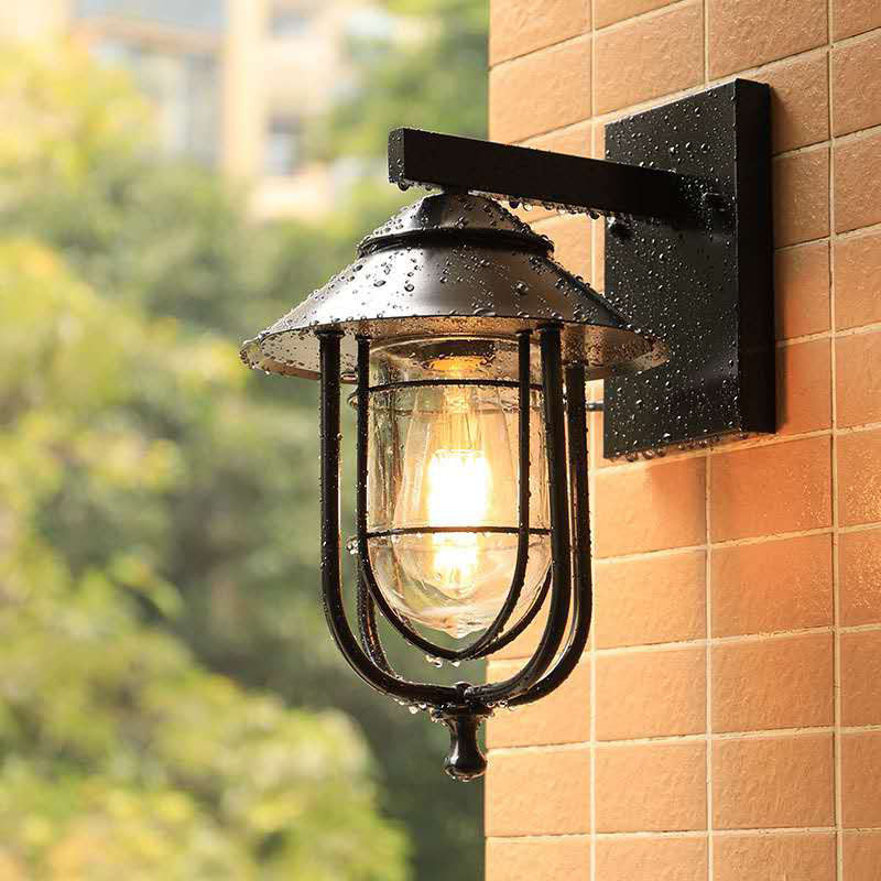Metal Lantern Balcony Wall Sconce With Oval Clear Glass Shade - Weathered Copper/Black Finish Black