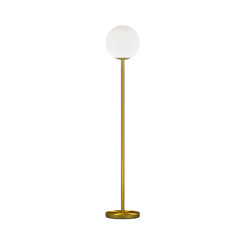 Contemporary Milky Glass Sphere Floor Light With Brass Finish - Ideal For Bedroom Reading