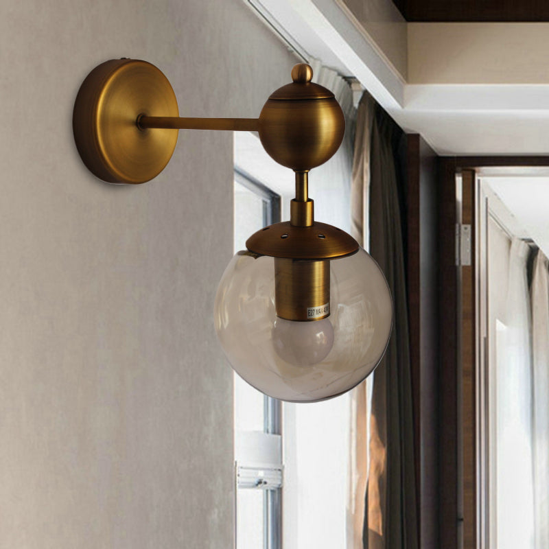 Post Modern Amber Glass Globe Wall Sconce With Brass Mount - 1/2 Light 1 /