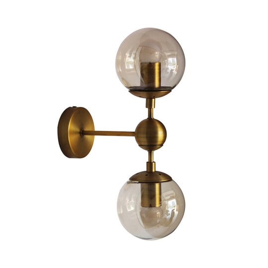 Post Modern Amber Glass Globe Wall Sconce With Brass Mount - 1/2 Light