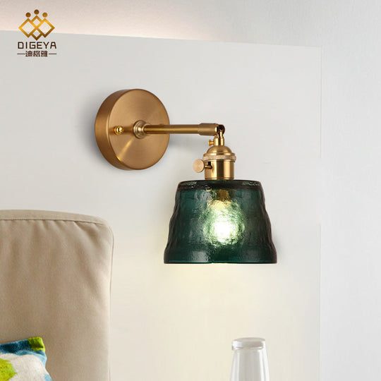 Antiqued Green Brass Wall Sconce With Dimpled Glass Shade And Adjustable Cone