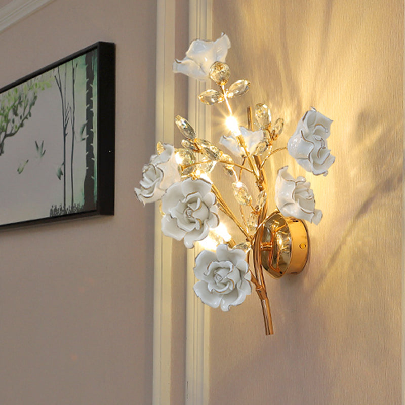 Contemporary Gold Crystal Wall Lamp With Teardrop Faceted Design And Ceramic Flower Accents - 3 Bulb