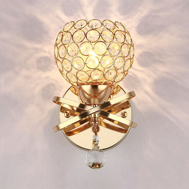 Globe Cutout Metal Shade Crystal Wall Sconce In Gold With Dropped Ball Accent