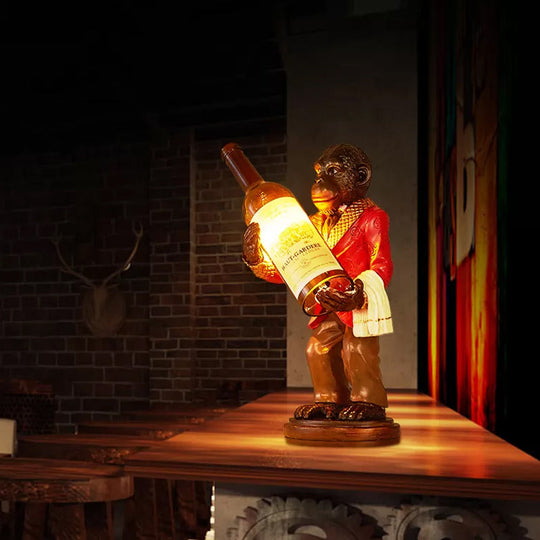 Retro Gorilla Wine Holder 1-Light Desk Lamp In Amber Glass For Night Table Red/Gold