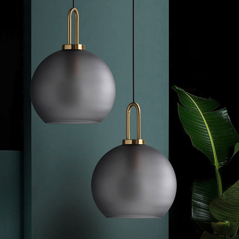 Modern Glass Sphere Pendant Light With Smoky Grey Frosted Finish Single-Bulb Brass Ceiling Hanging