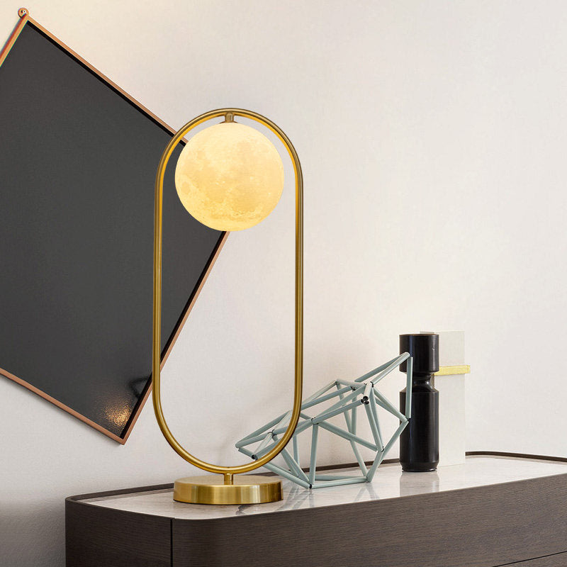 Minimalist Gold Metal Nightstand Lamp With Moon Glass Shade