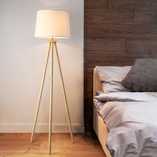 Minimalistic Tripod Floor Lamp With White Drum Shade - 1 Light Fabric