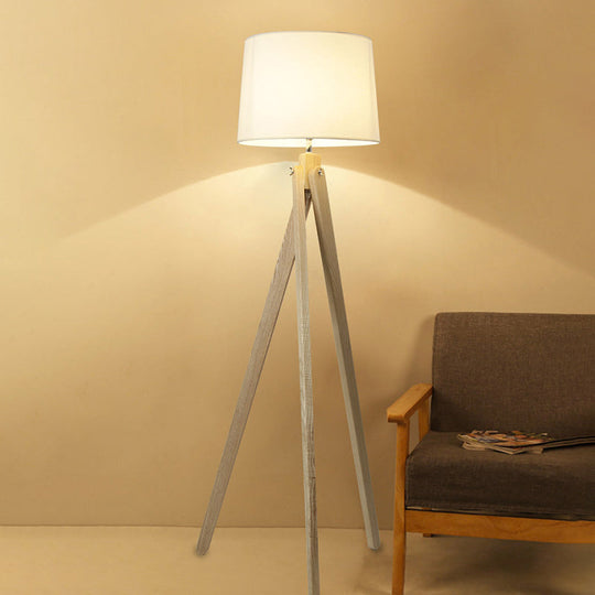 Minimalist Beige Tri-Leg Floor Lamp With Tapered Drum Shade - 1-Light Standing Light Fixture