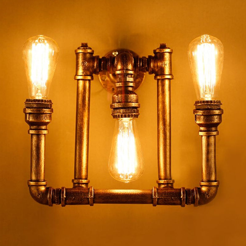 3-Head Industrial Sconce With Wrought Iron Pipe Design In Aged Brass For Hallway