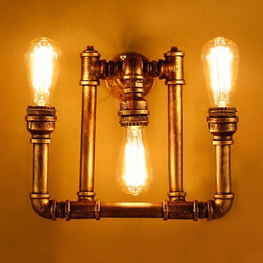3-Head Industrial Sconce With Wrought Iron Pipe Design In Aged Brass For Hallway