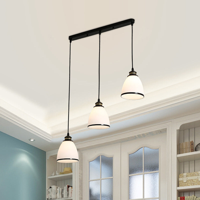 Ivory Glass Bell Pendant Light Cluster With Minimalist Design And Black Canopy - 3 Lights