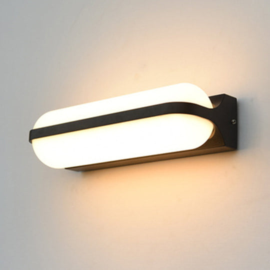 Modern Black Acrylic Wall Sconce With Flush Capsule Design And Half-Bulb Mounting