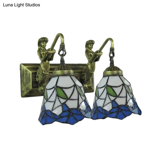 2-Head Mediterranean Antique Bronze Wall Mount Sconce With Flared Blue And White Glass Shade