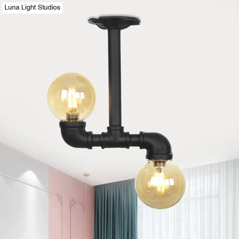 2-Head Semi-Flush Industrial Ball Amber Glass Ceiling Fixture In Black / B