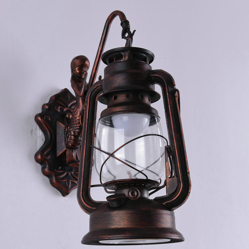 Nautical Clear Glass Kerosene Wall Sconce With Curved Arm For Restaurants Copper / A
