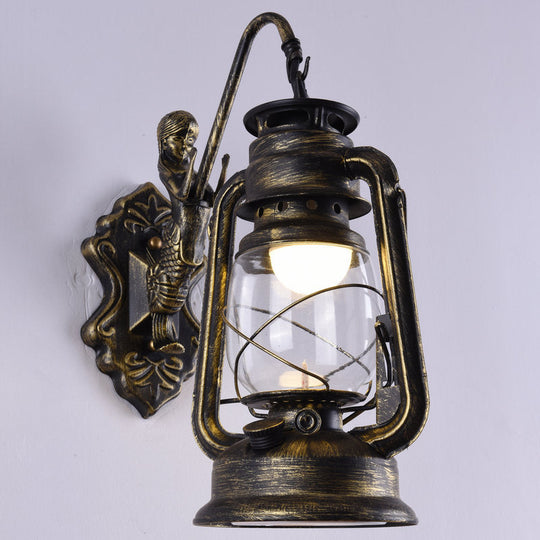 Nautical Clear Glass Kerosene Wall Sconce With Curved Arm For Restaurants Brass / A