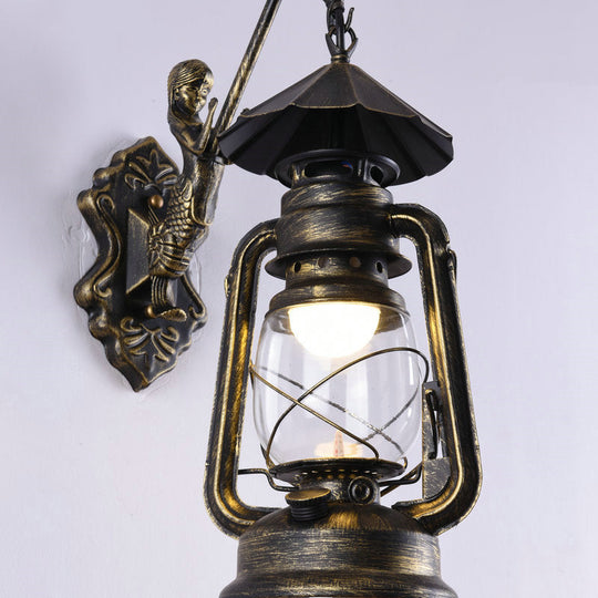 Nautical Clear Glass Kerosene Wall Sconce With Curved Arm For Restaurants Brass / B