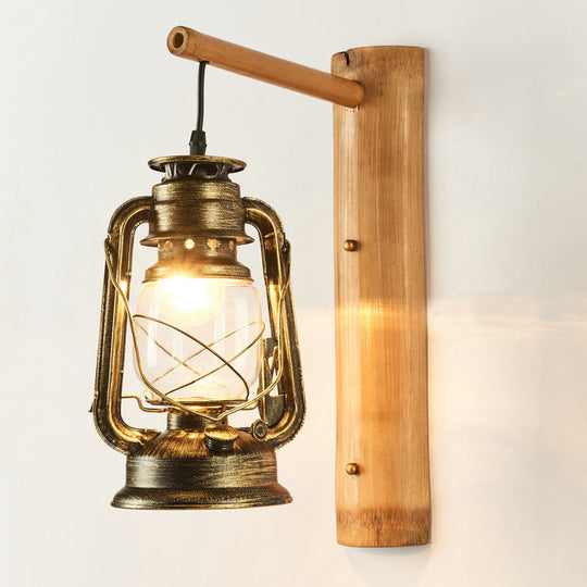 Coastal Lantern 1-Head Wall Light Sconce With Clear Glass And Bamboo Backplate Bronze