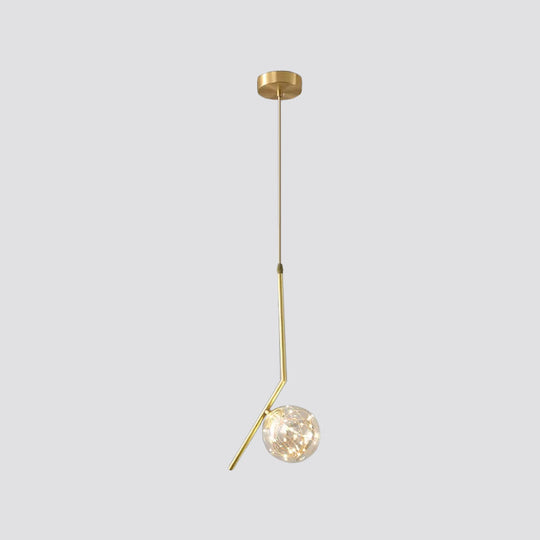 Sleek Brass Sphere Led Pendant Lamp For Modern Dining Rooms
