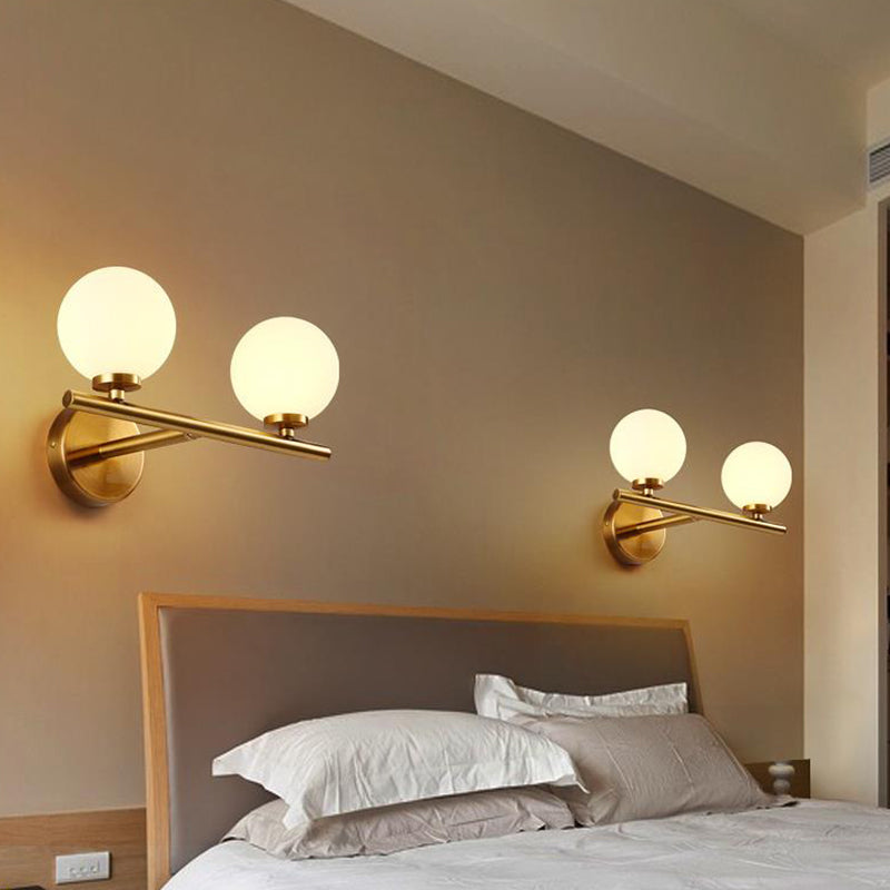 Contemporary White Glass Bedside Wall Light In Gold - Spherical Lighting Fixture